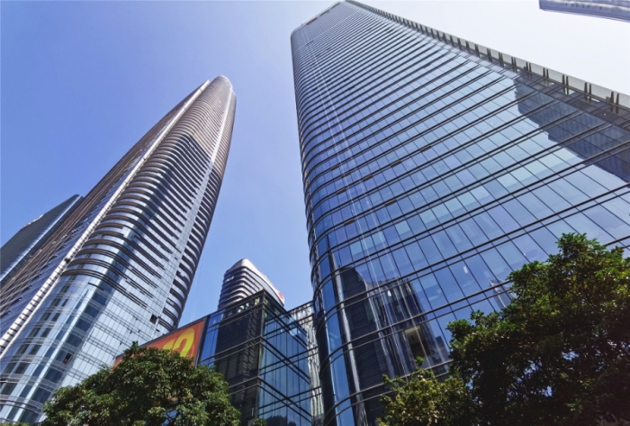 玻璃幕墙为什么越建越多，它真的安全吗？佛山玻璃幕墙定制工厂